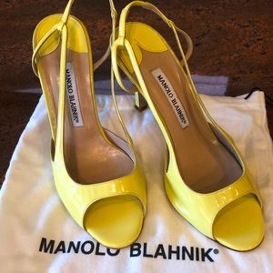 Manolo Blahnik slingback open toed heels.